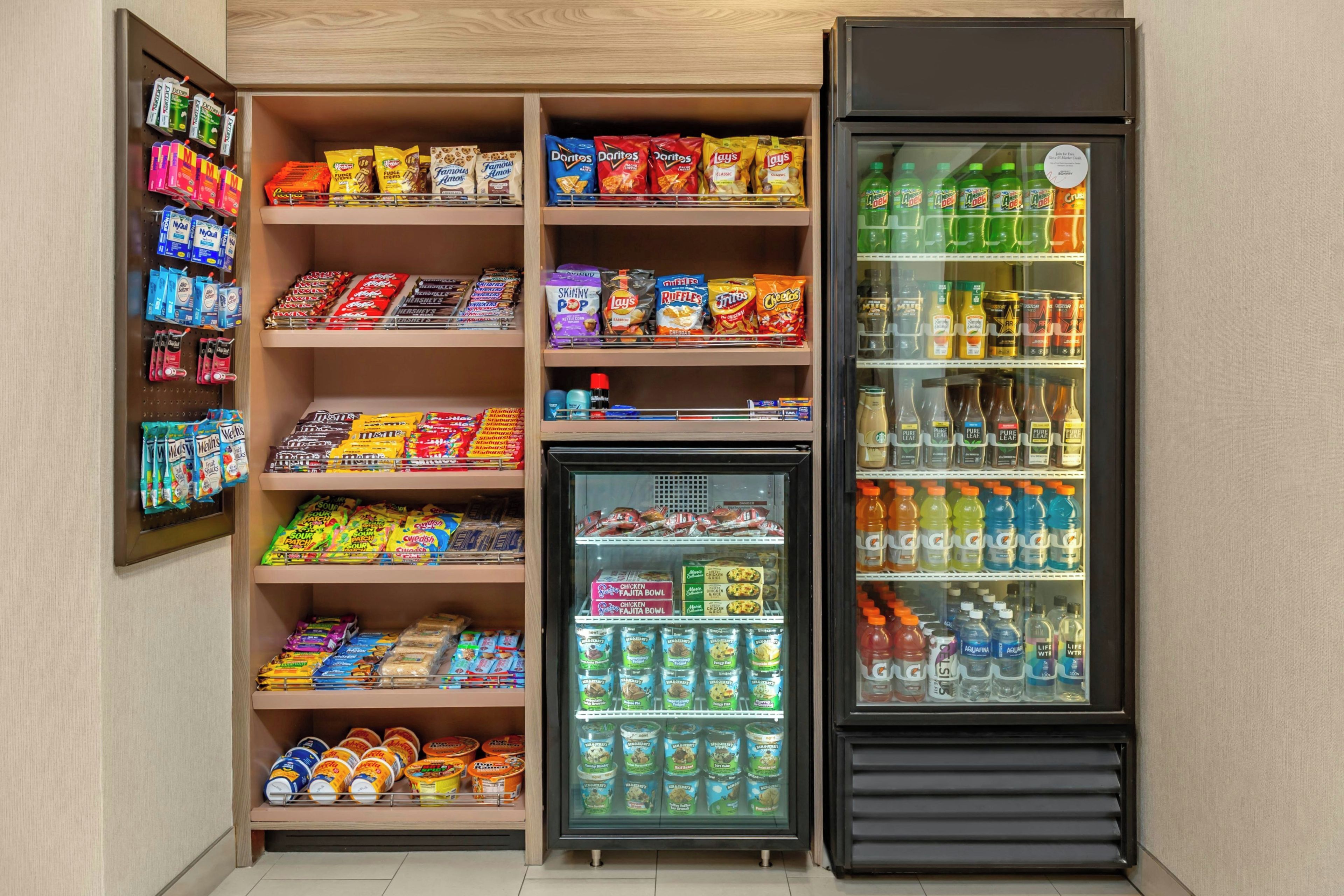 A snack and beverage vending machine with various snacks and drinks.