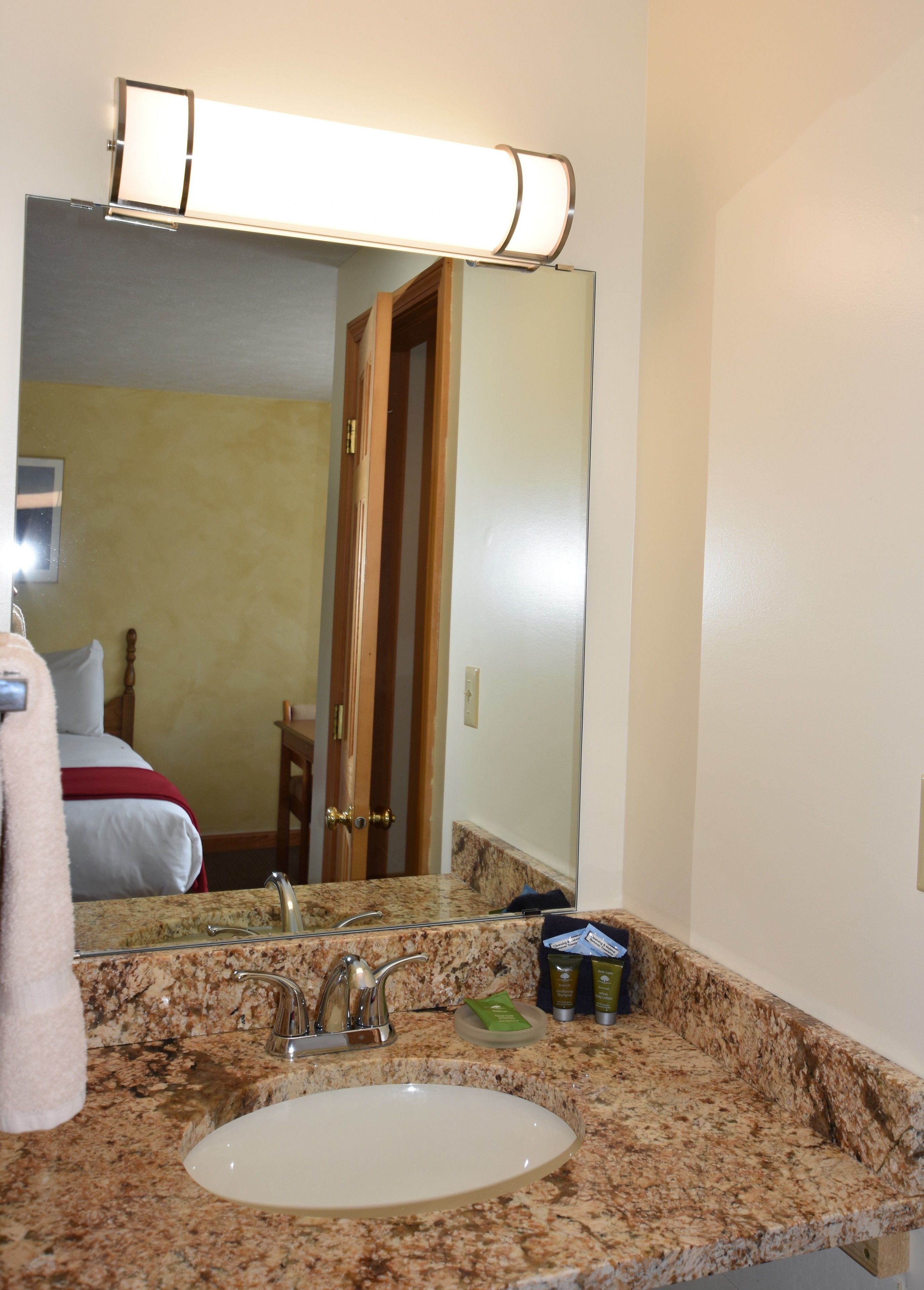 double room, refrigerator, garden view | bathroom sink