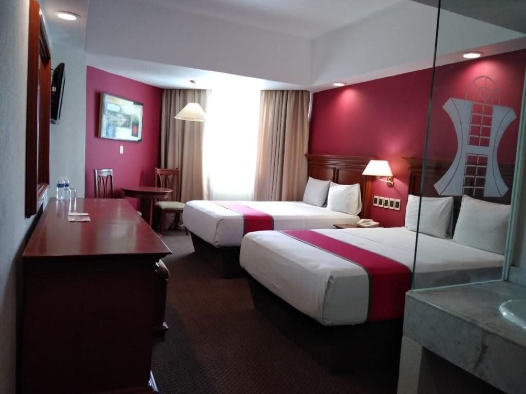 Premium bedding, down comforters, in-room safe, desk