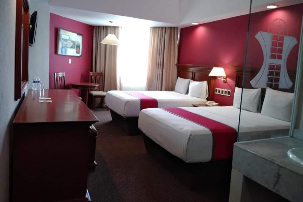 Premium bedding, down comforters, in-room safe, desk