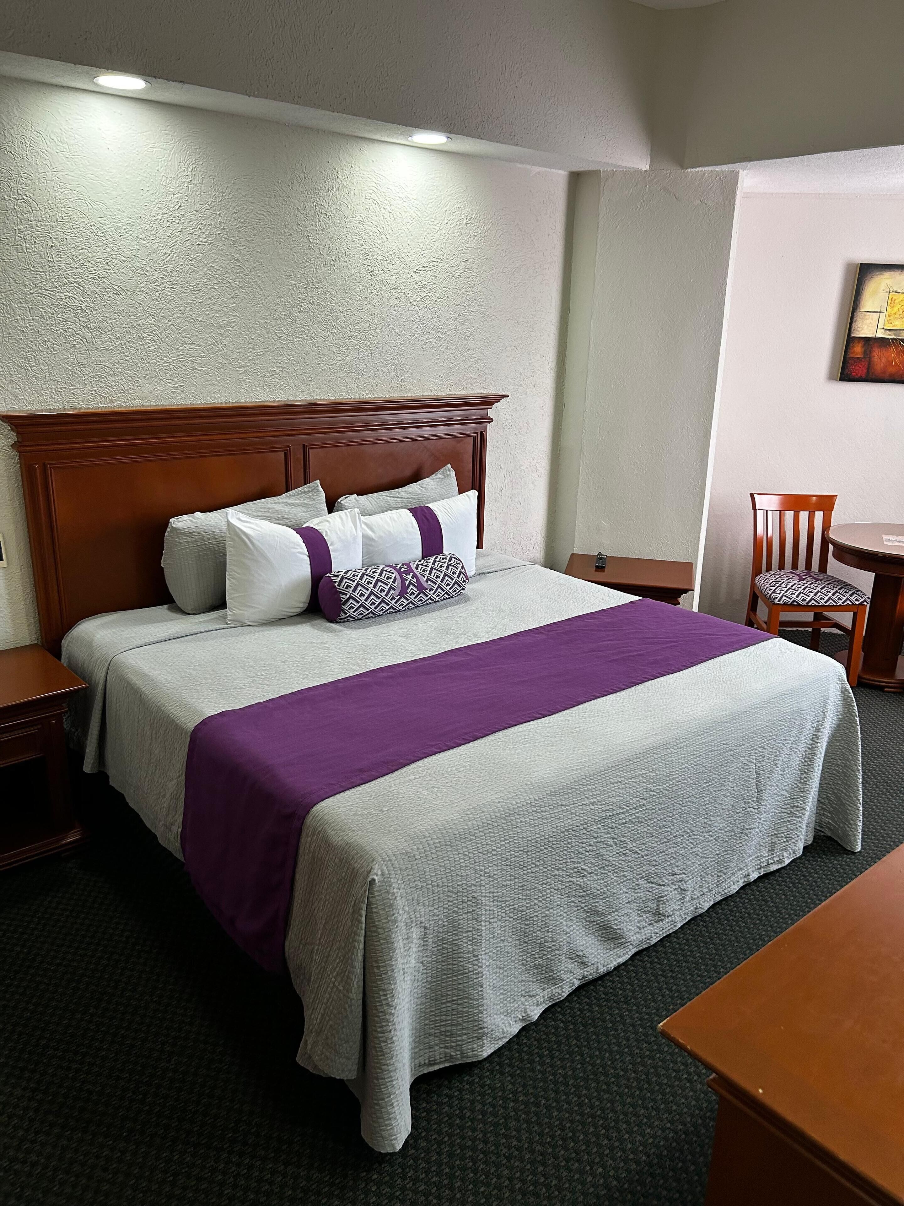Premium bedding, down comforters, in-room safe, desk
