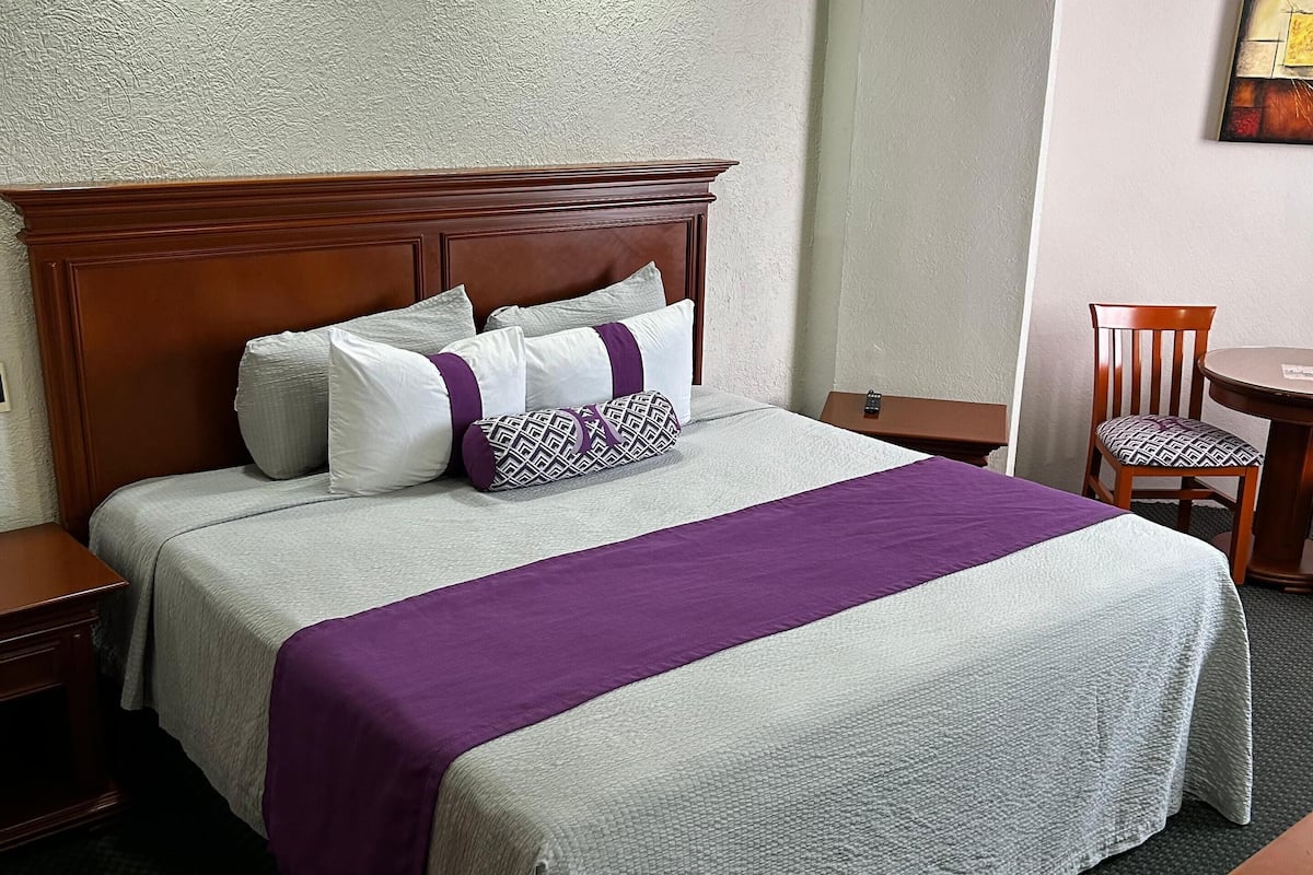Premium bedding, down comforters, in-room safe, desk