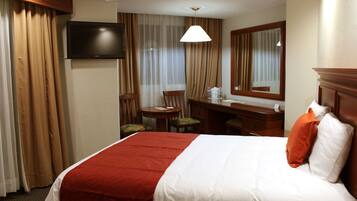 Premium bedding, down comforters, in-room safe, desk