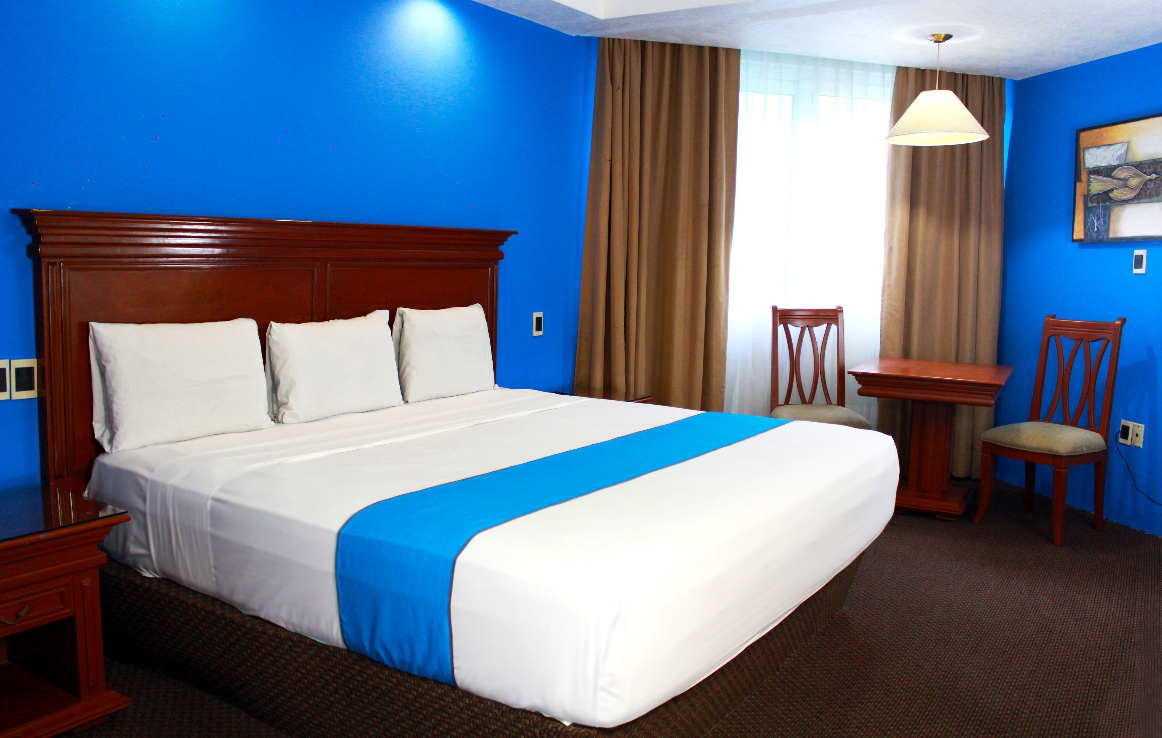 Premium bedding, down duvets, in-room safe, desk