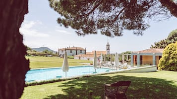 Seasonal outdoor pool, pool umbrellas, pool loungers