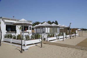 Private beach, sun loungers, beach umbrellas, beach bar