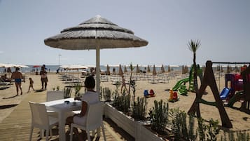 Private beach, sun-loungers, beach umbrellas, beach bar