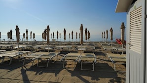 Private beach, sun loungers, beach umbrellas, beach towels