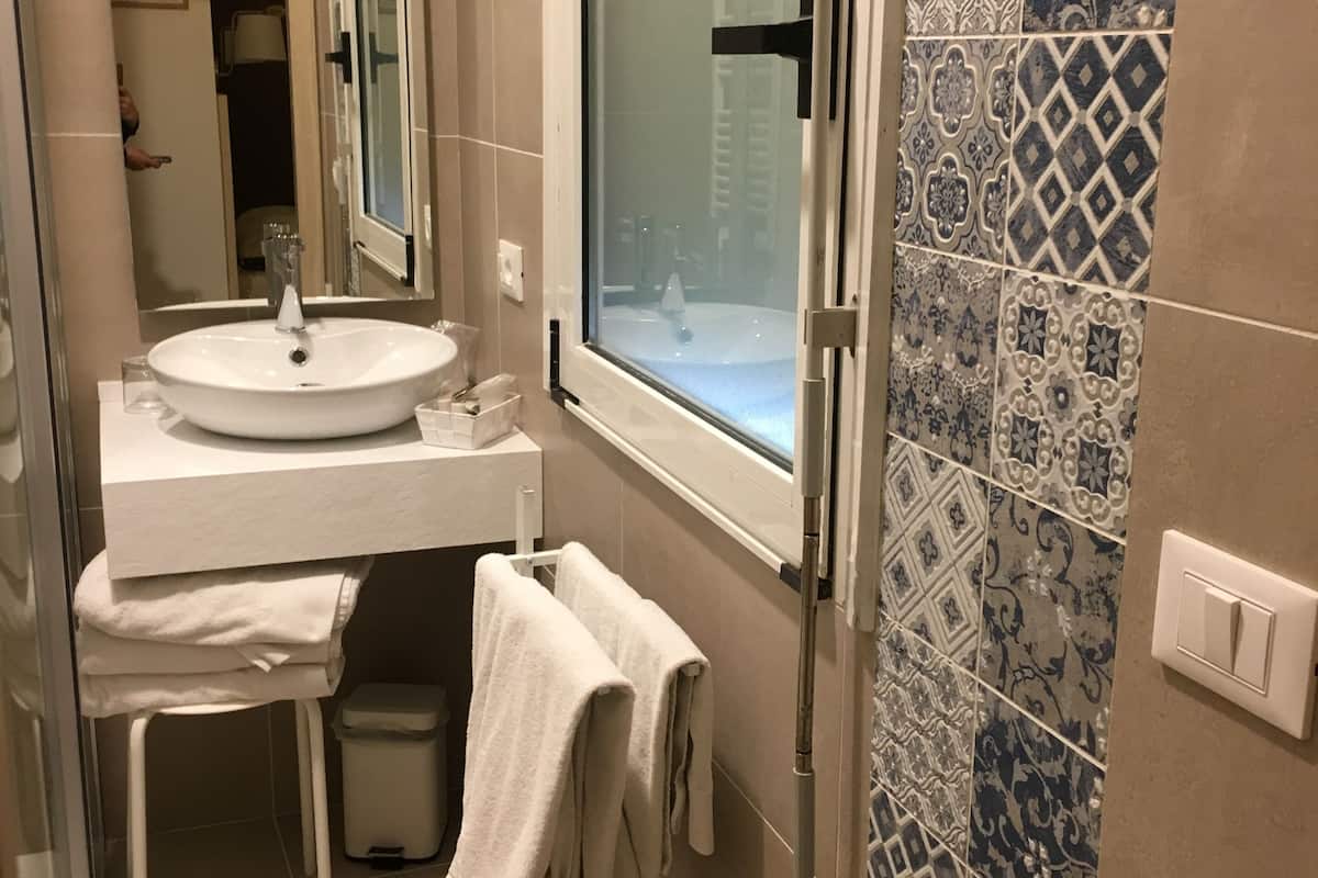 triple room | bathroom | shower, hair dryer, bidet, towels