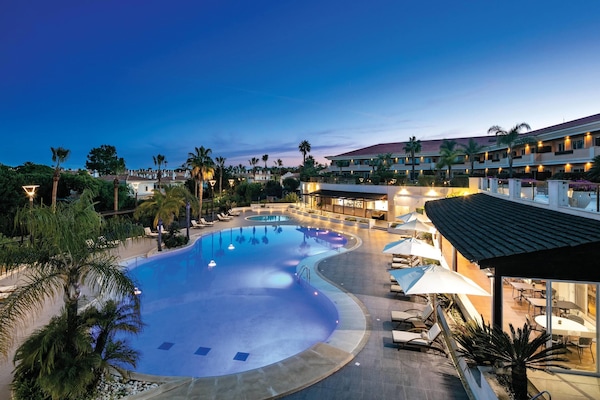 Indoor pool, 2 outdoor pools, open 9:00 AM to 7:00 PM, pool umbrellas