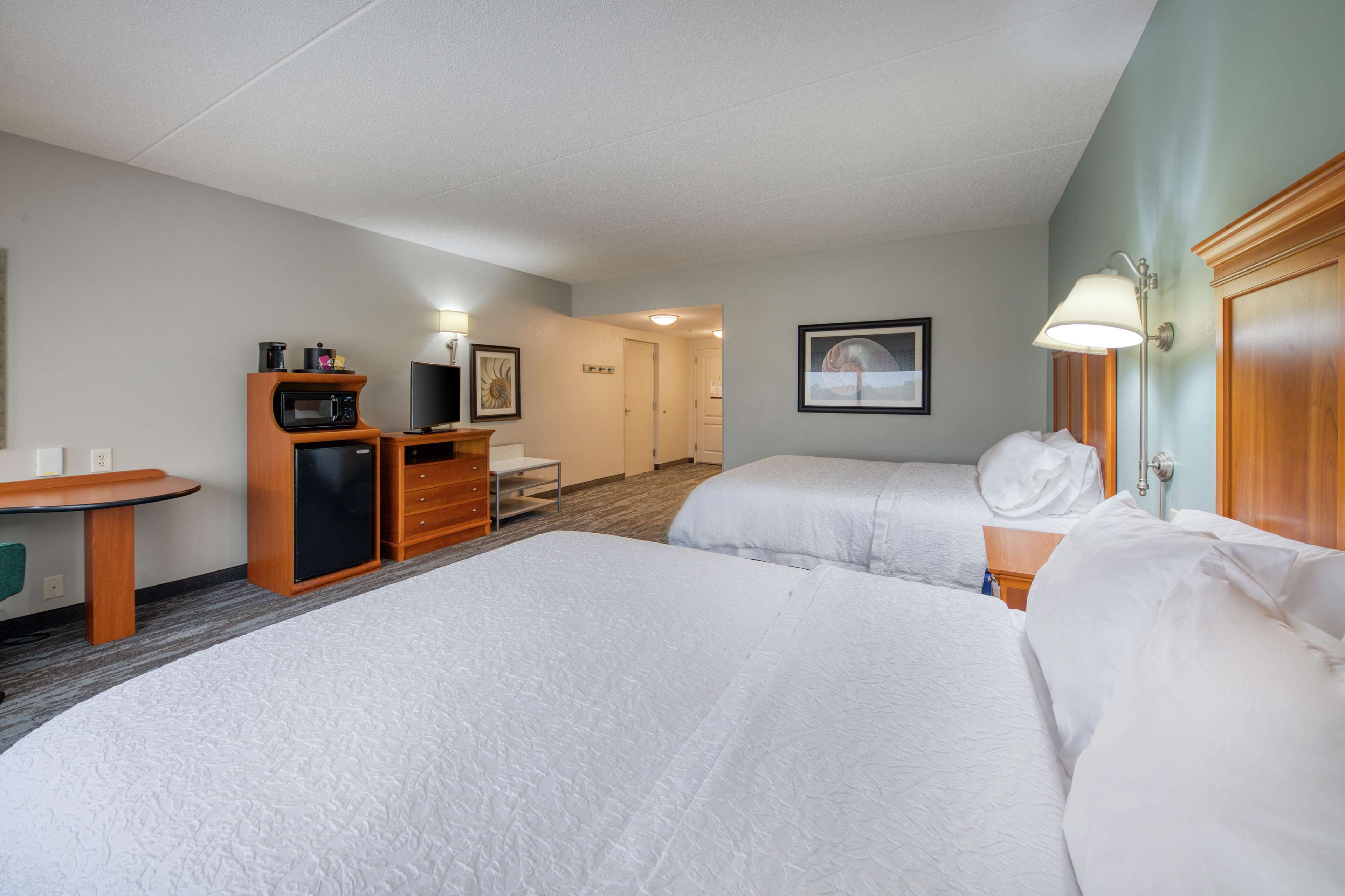 Premium bedding, desk, blackout drapes, iron/ironing board