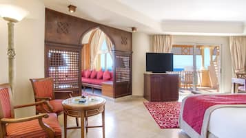 Premium bedding, down comforters, minibar, in-room safe