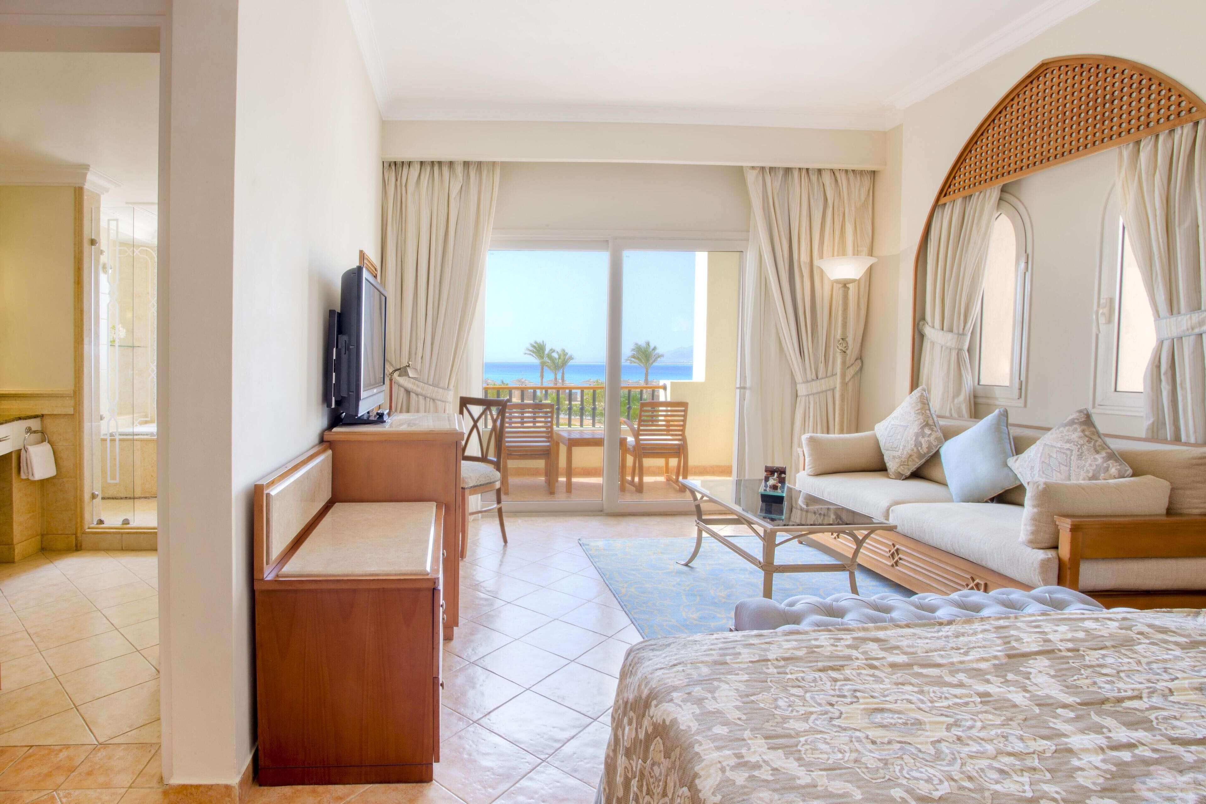 Premium bedding, down comforters, minibar, in-room safe