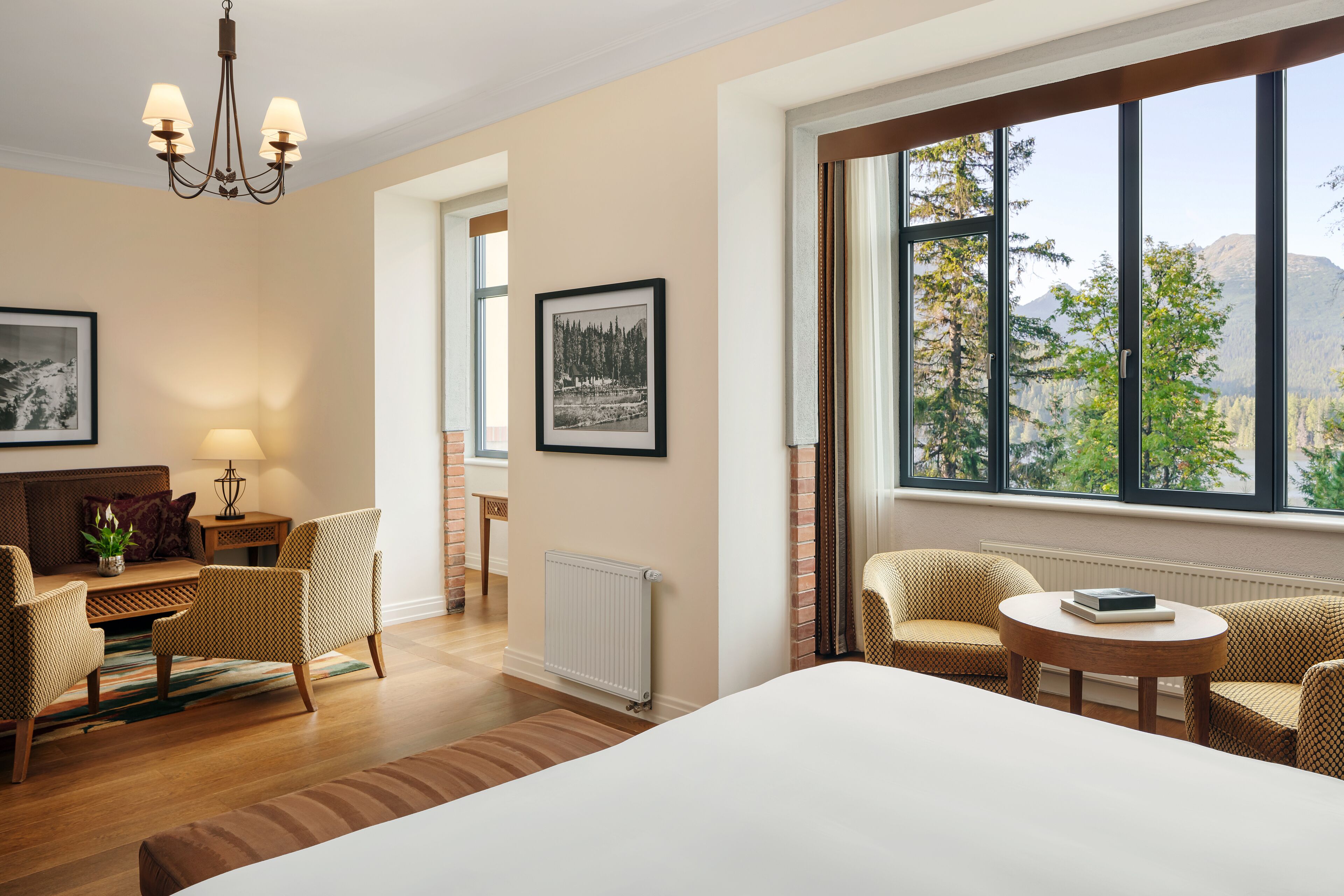 junior room, bathtub, mountain view (lake view junior suite) | premium bedding, down duvets, minibar, in-room safe