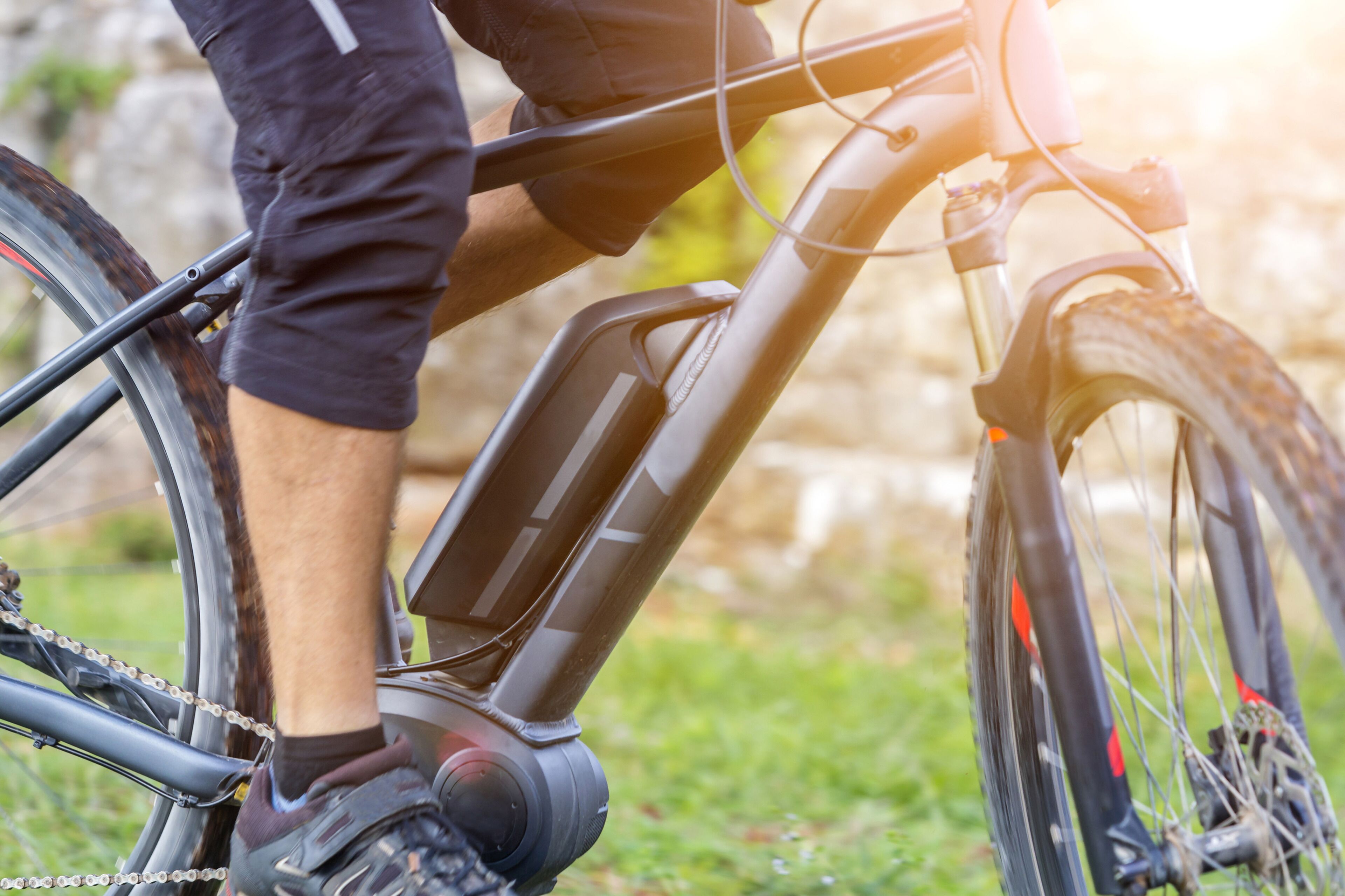 A close-up of a bicycle's frame and pedal area.