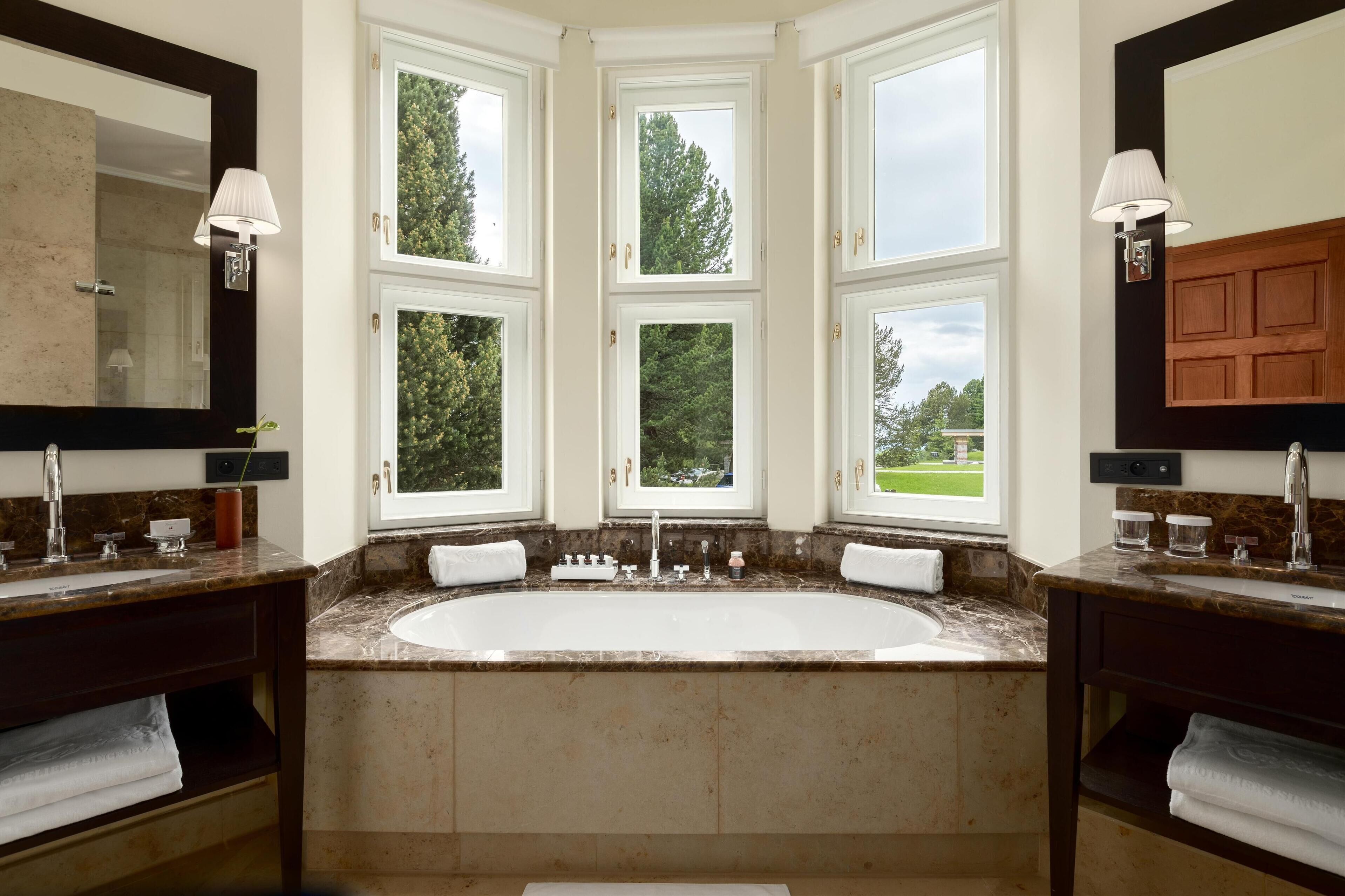 grand suite, 1 bedroom, jetted tub, garden view (grand deluxe janosik suite) | bathroom | combined shower/bathtub, deep-soaking bathtub, rainfall showerhead