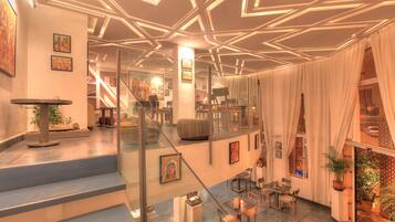 Breakfast, lunch served; local and international cuisine, garden views