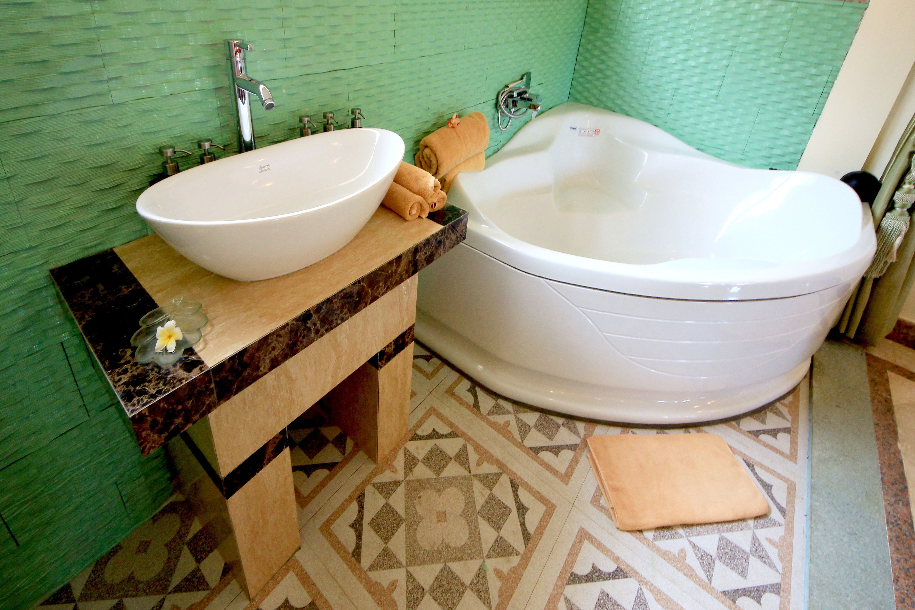 couples treatment room(s), hot tub, body treatments, hot stone massages