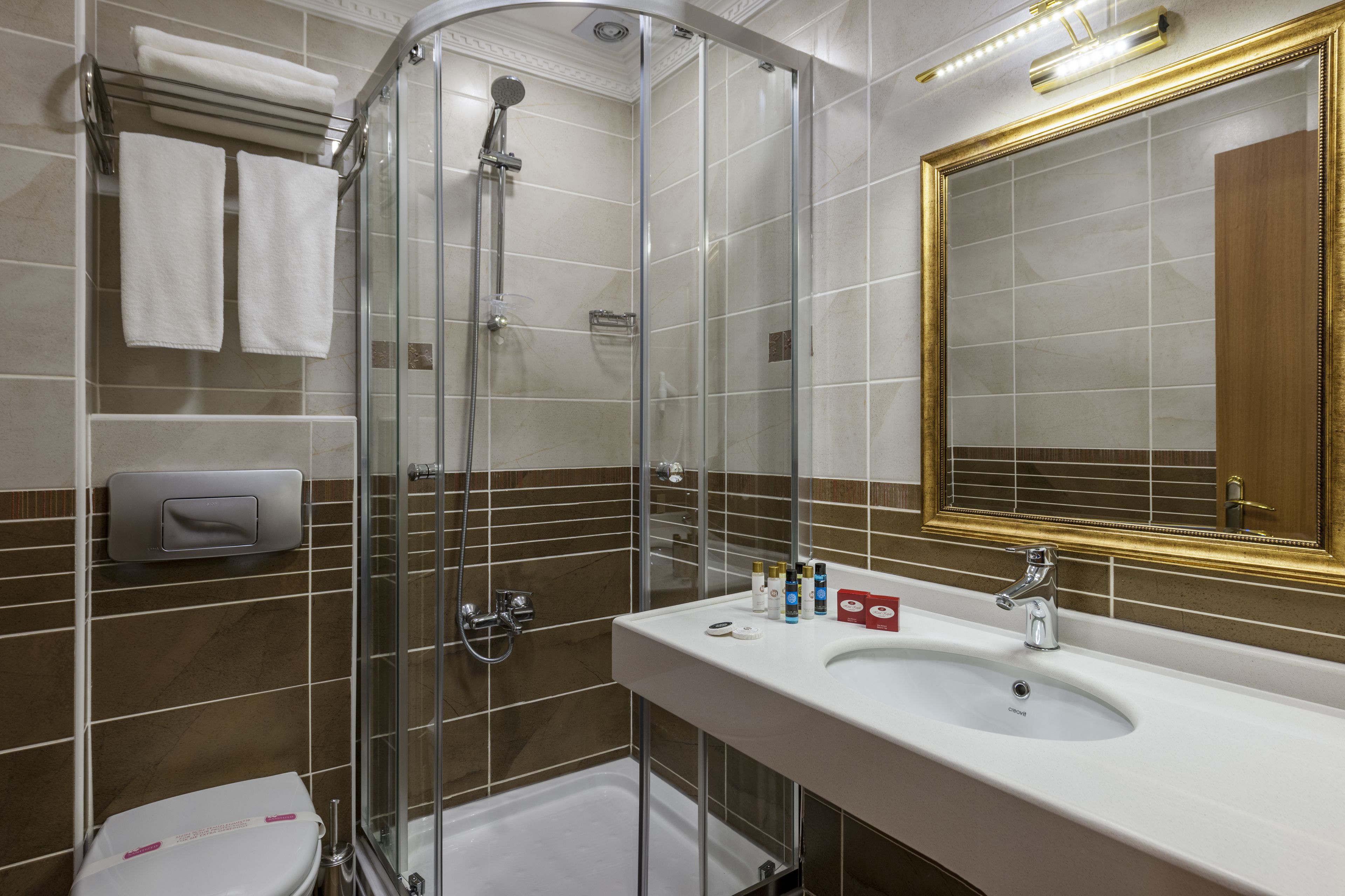 shower, free toiletries, hair dryer, slippers