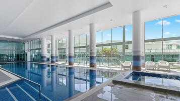 Indoor pool, outdoor pool, open 6:00 AM to 10:00 PM, pool loungers