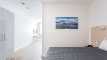 Ropa de cama de alta calidad, minibar, escritorio y cortinas blackout
