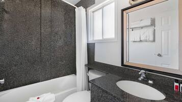 Combined shower/tub, eco-friendly toiletries, hair dryer, towels