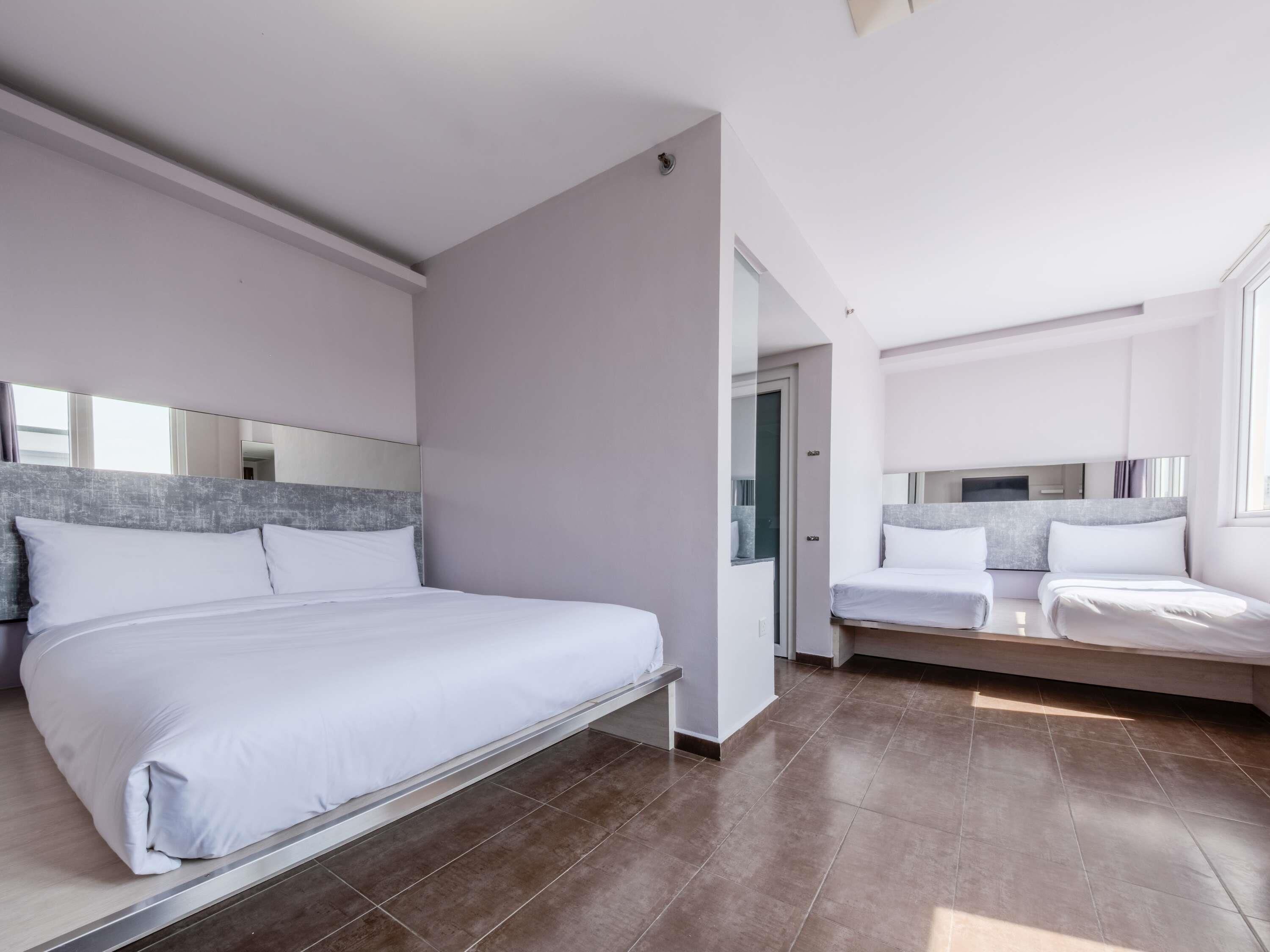 Deluxe Double Room, Multiple Beds | Desk, iron/ironing board (on request), free WiFi, bed sheets