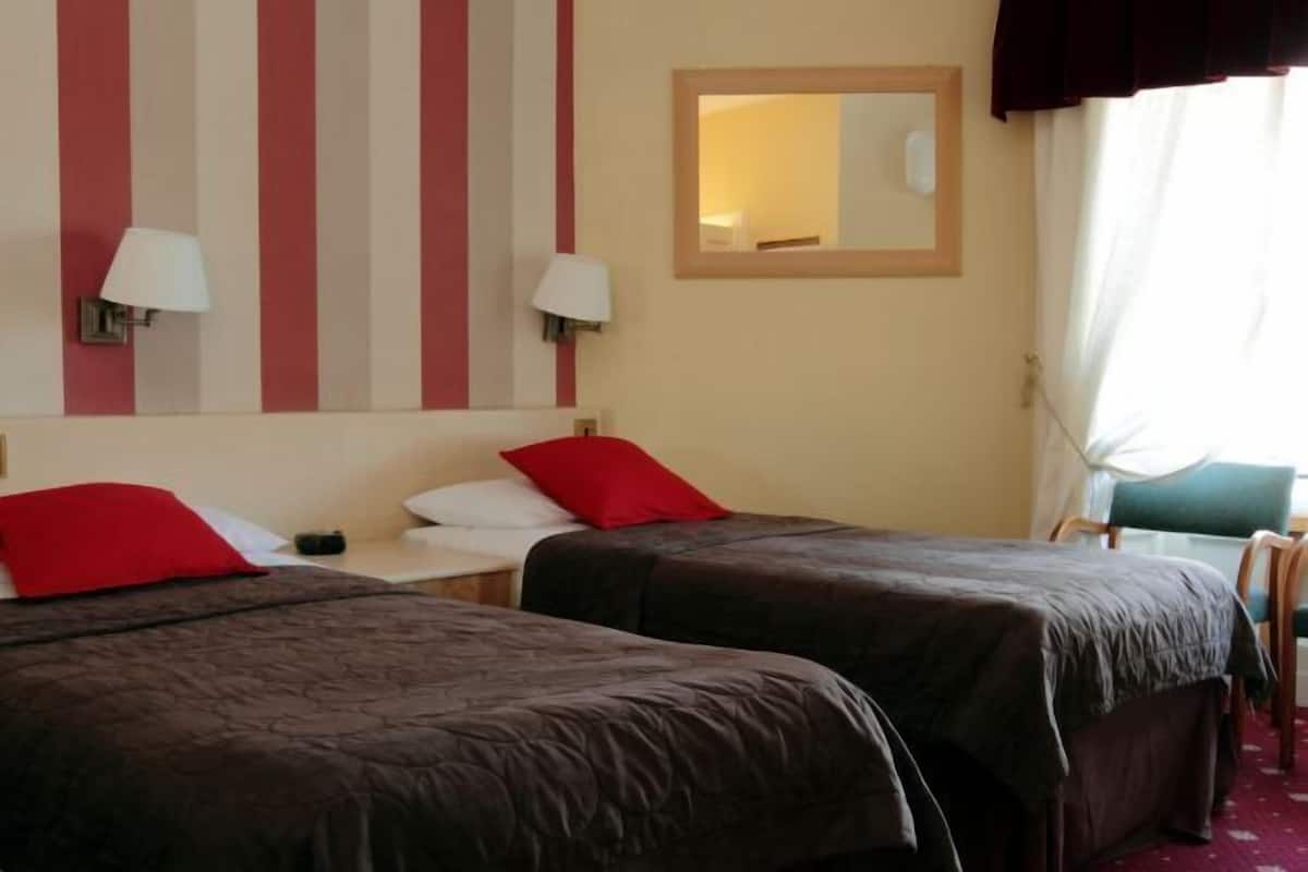 Biancheria da letto di alta qualità, una cassaforte in camera