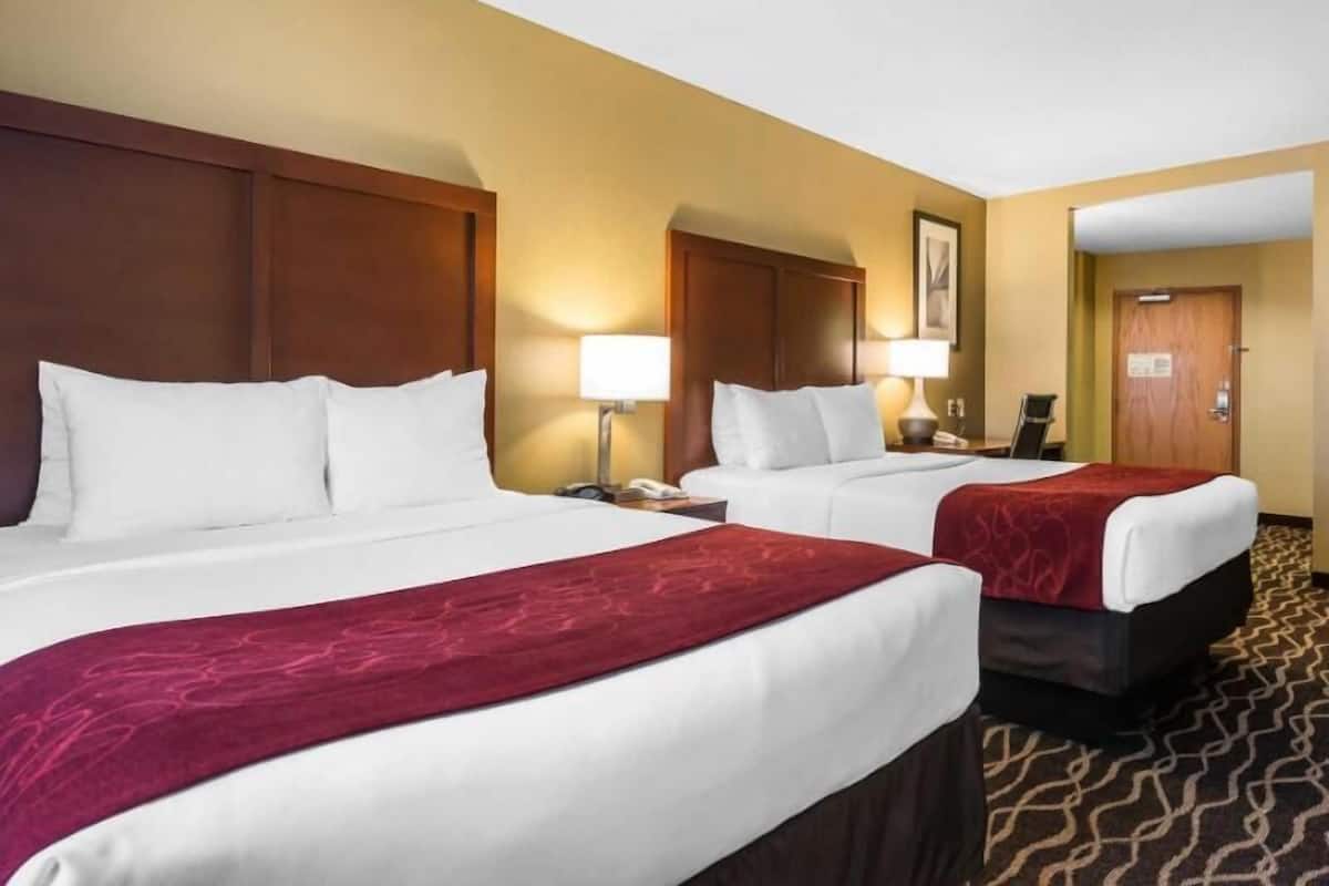 Pillow-top beds, desk, blackout curtains, iron/ironing board