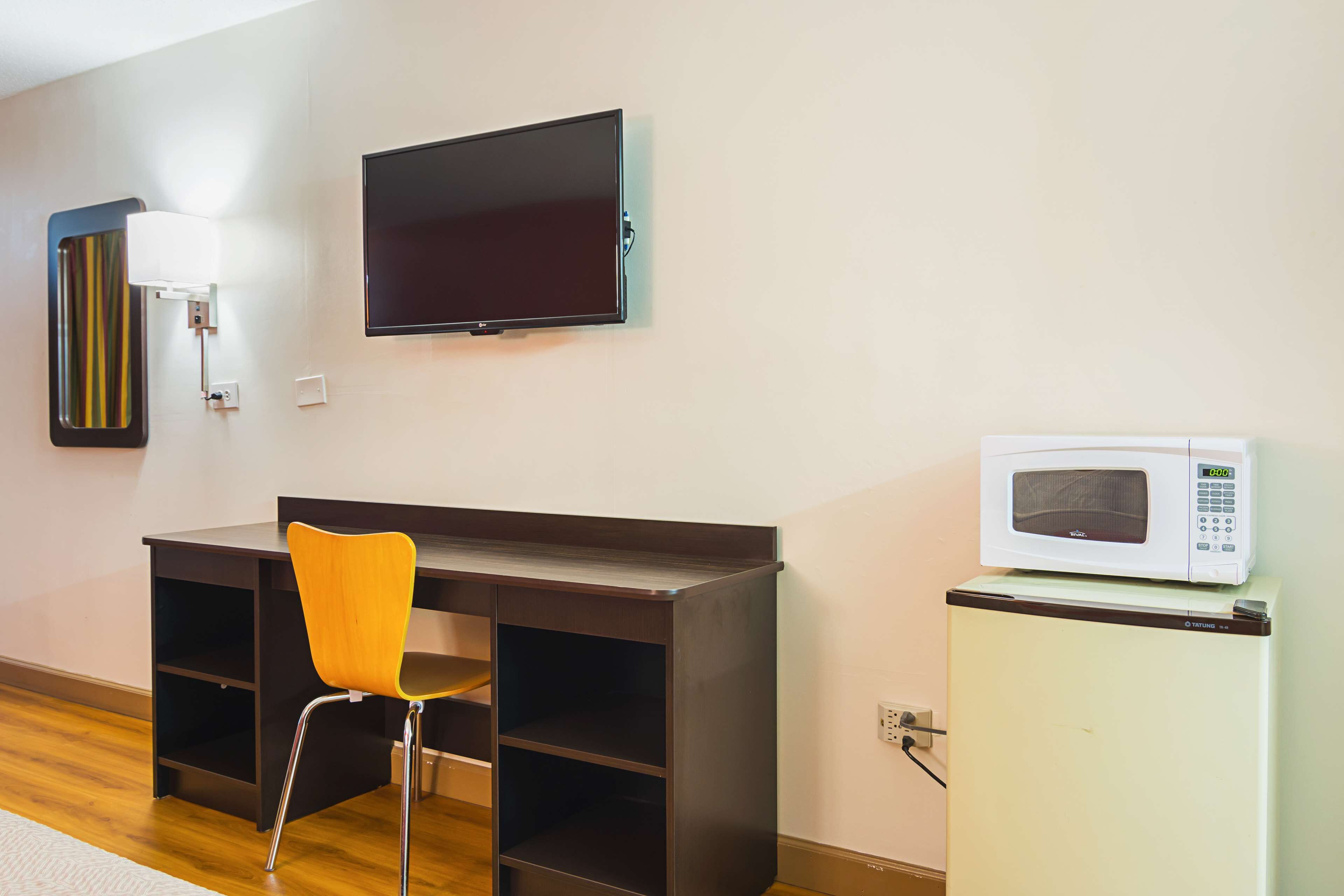 Desk, free WiFi, bed sheets, alarm clocks