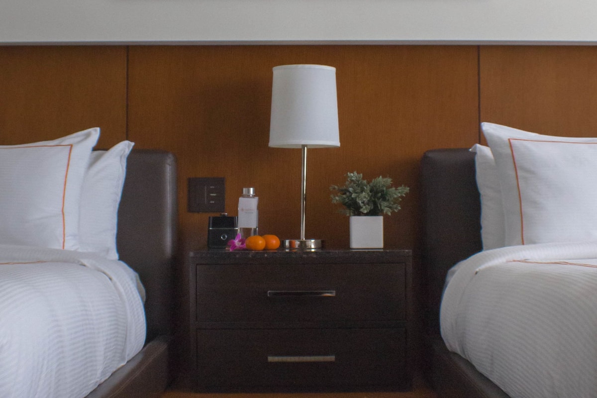 Premium bedding, down comforters, pillowtop beds, in-room safe