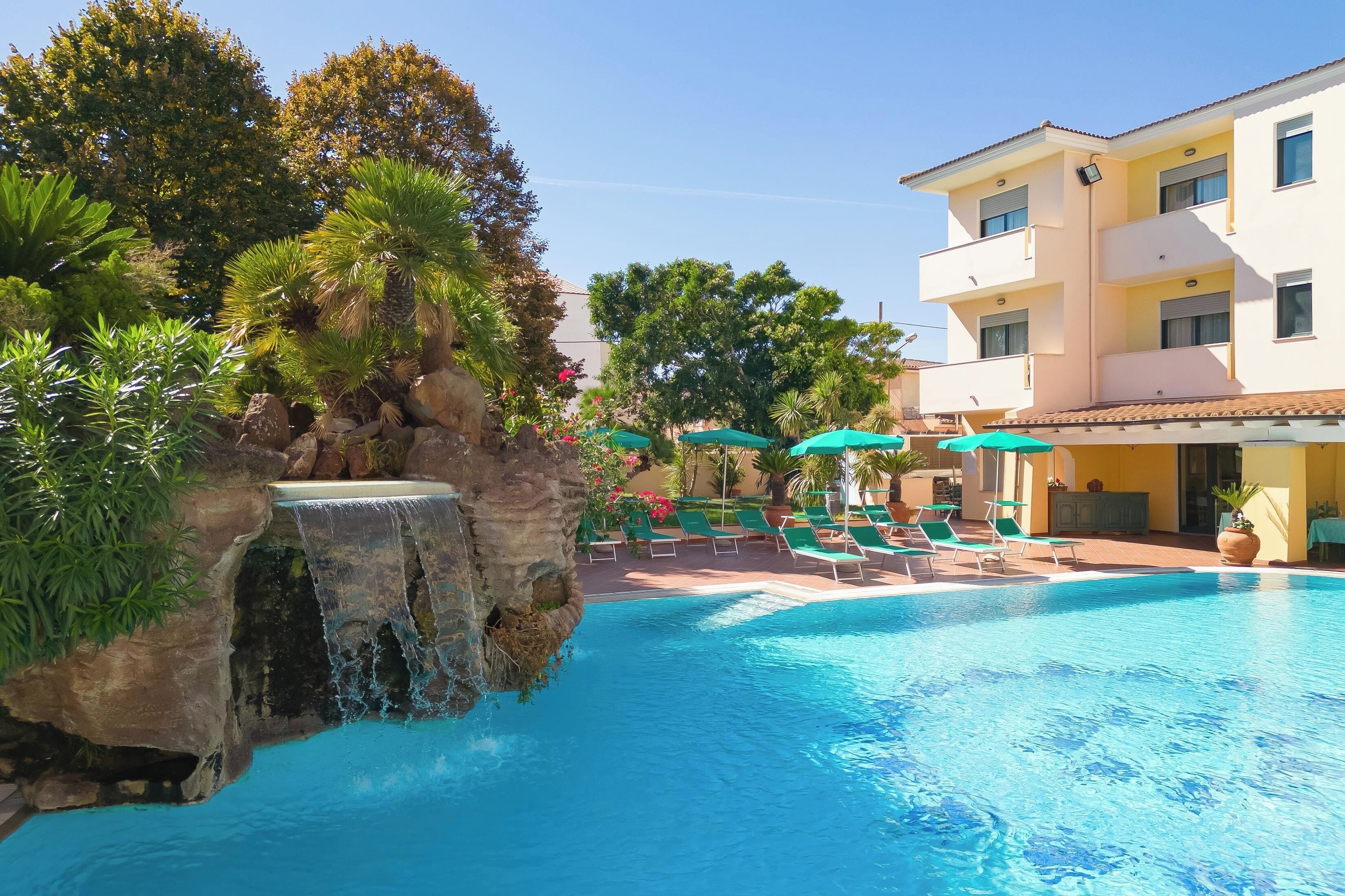 outdoor pool, pool umbrellas, pool loungers