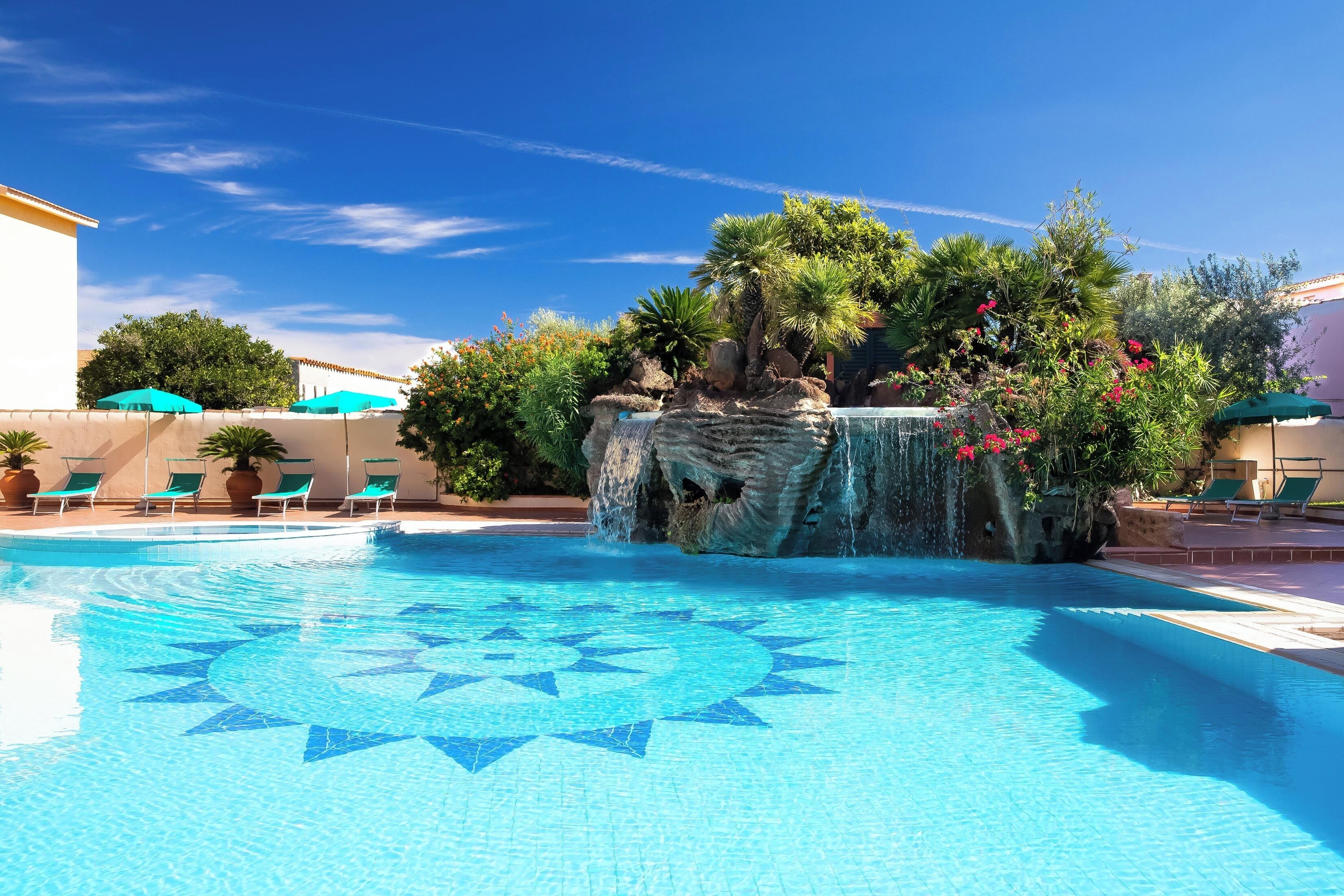 outdoor pool, pool umbrellas, pool loungers