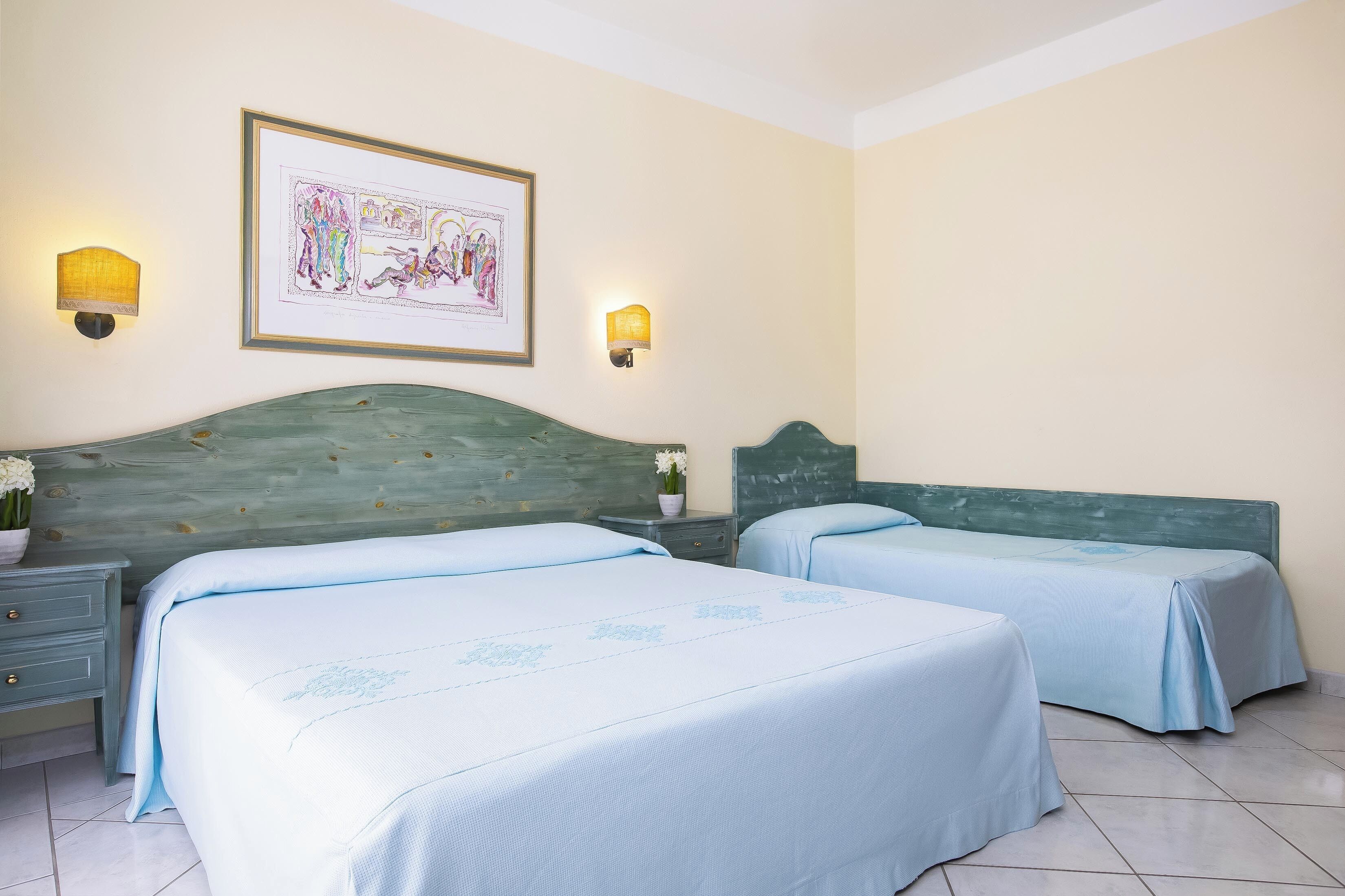 triple room | minibar, in-room safe, free cots/infant beds, wifi