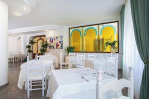 Breakfast, lunch, dinner served; pool views