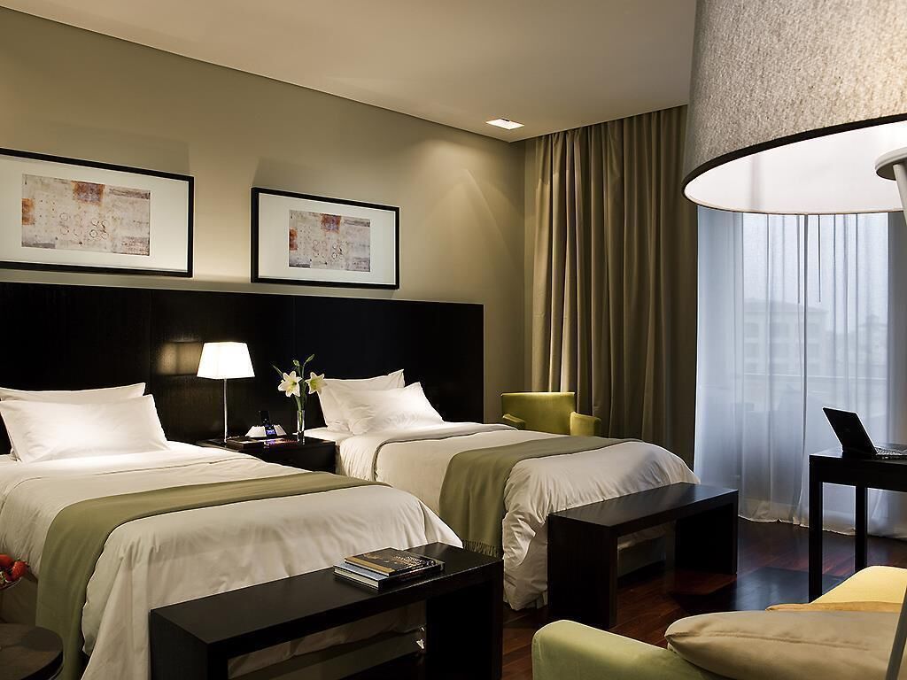 Superior kamer, 2 eenpersoonsbedden | Luxe beddengoed, een minibar, een kluis op de kamer, een bureau