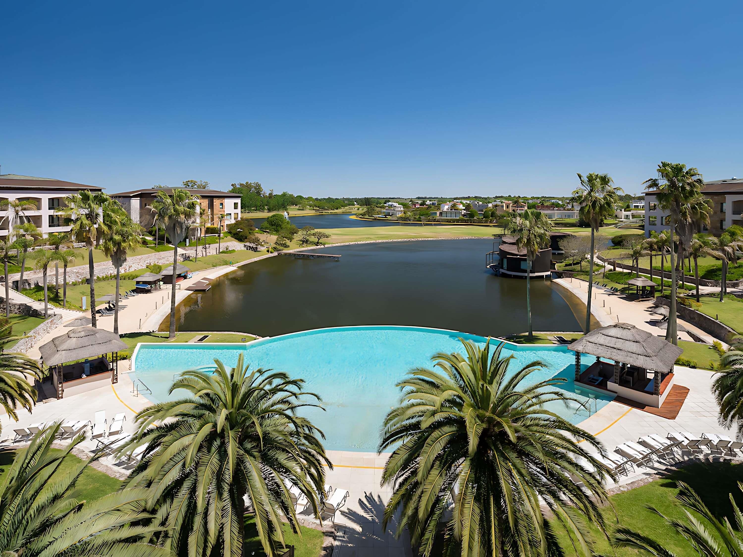 Indoor pool, outdoor pool, pool umbrellas, sun loungers