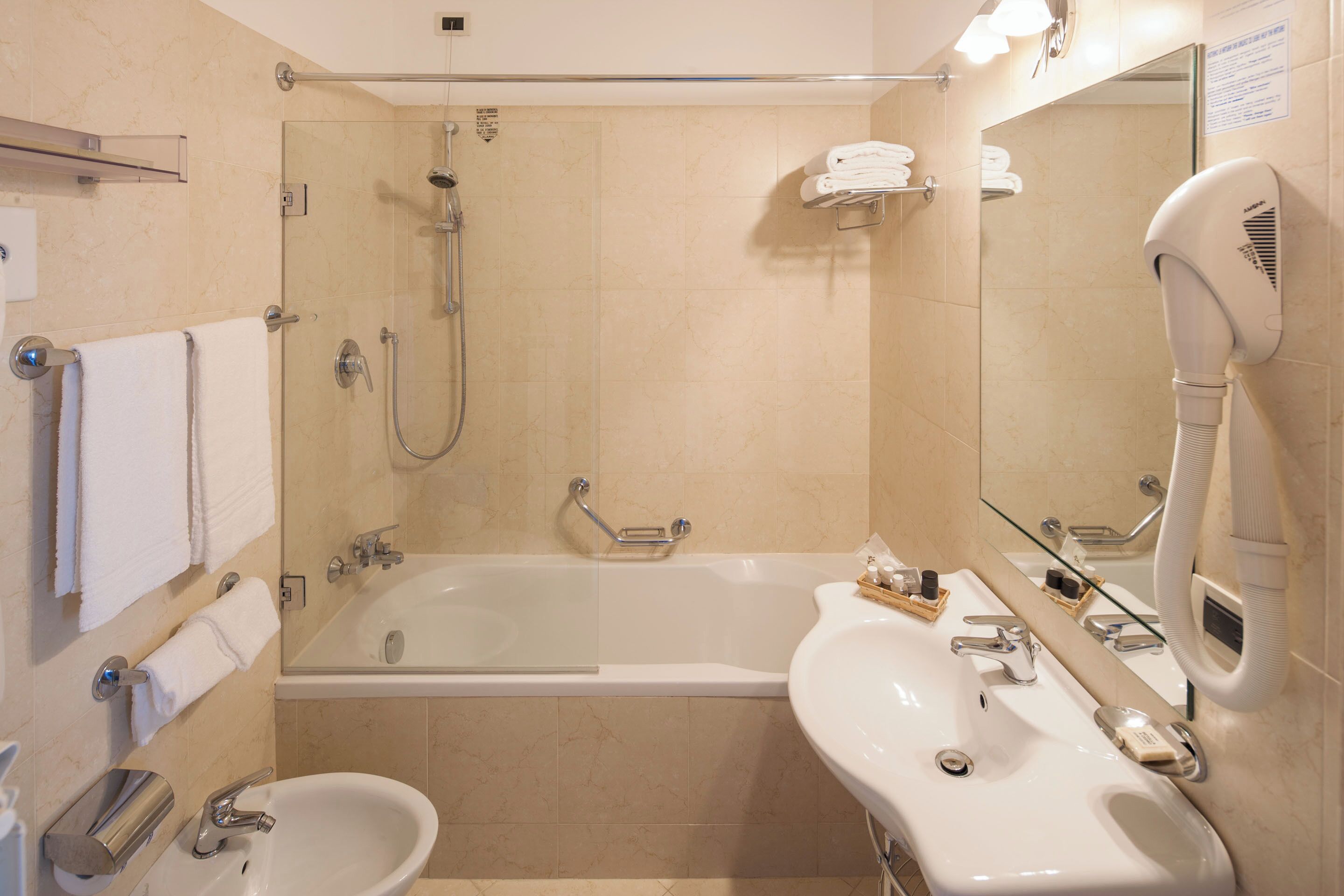 free toiletries, hair dryer, slippers, bidet