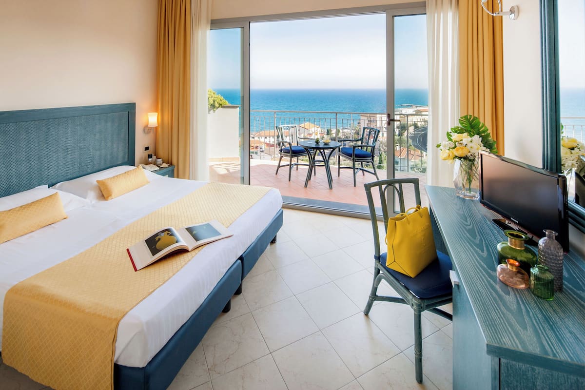 classic double room, sea view | premium bedding, down duvets, pillow-top beds, minibar
