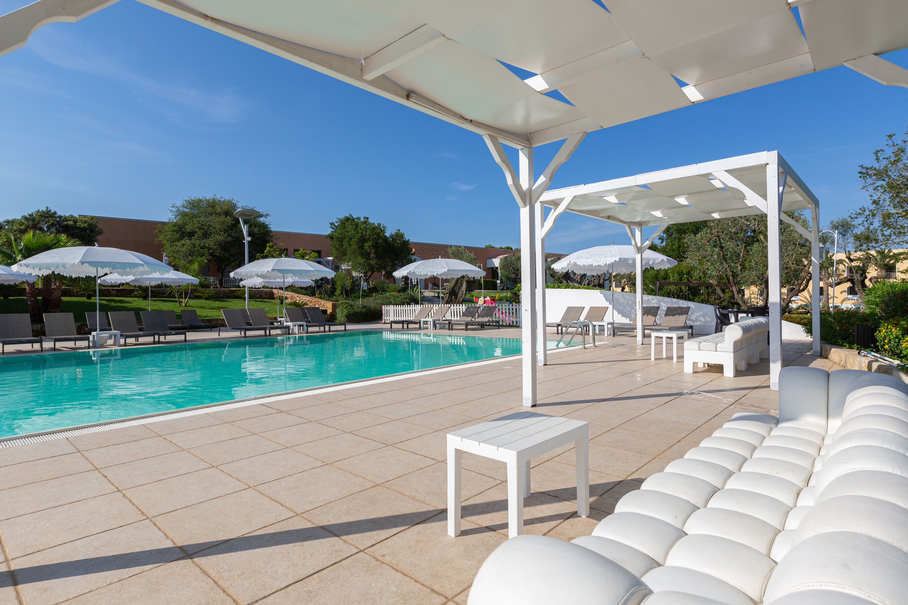 outdoor pool, pool umbrellas, pool loungers