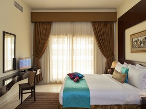 Deluxe Apartment, 1 Bedroom | In-room safe, desk, iron/ironing board, free WiFi