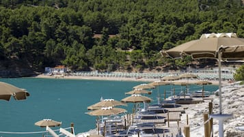 Playa privada, arena blanca, traslado desde/hacia la playa gratis