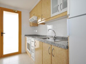 Fridge, microwave, coffee/tea maker, highchair