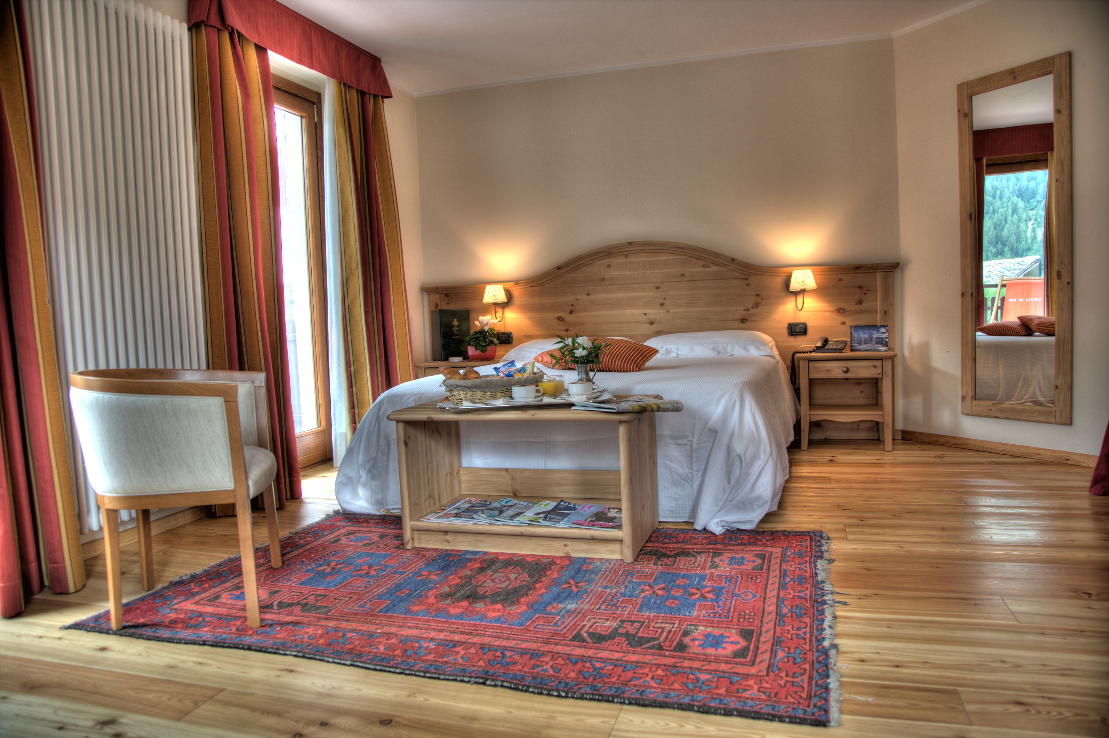 junior suite (one king bed & two single beds) | down duvets, minibar, in-room safe, desk