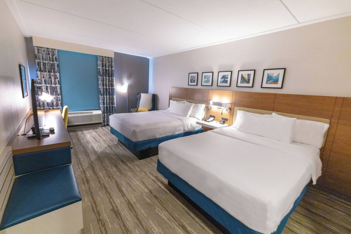 Luxe beddengoed, een kluis op de kamer, een strijkplank/strijkijzer