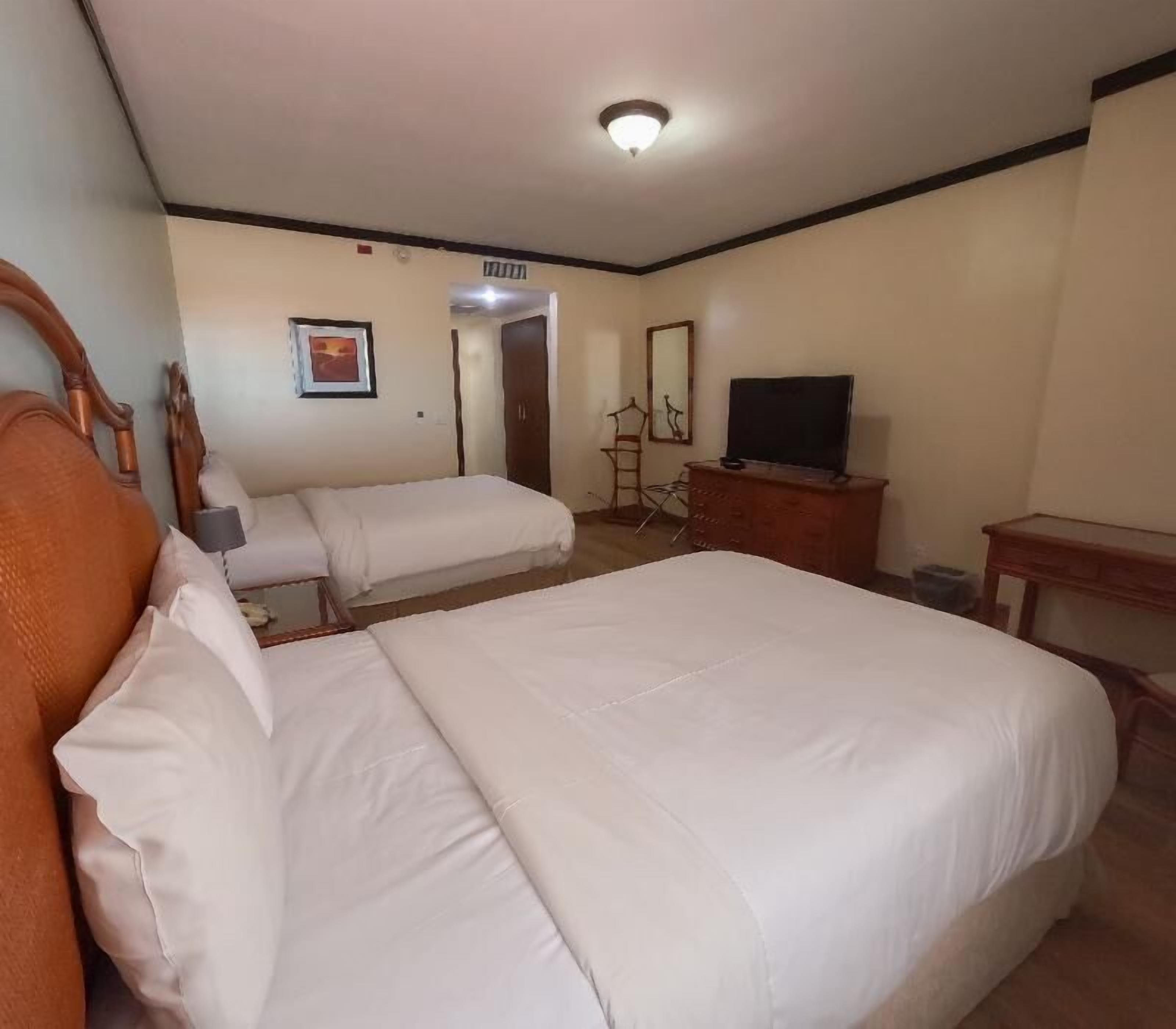 Premium bedding, down comforters, Select Comfort beds, minibar