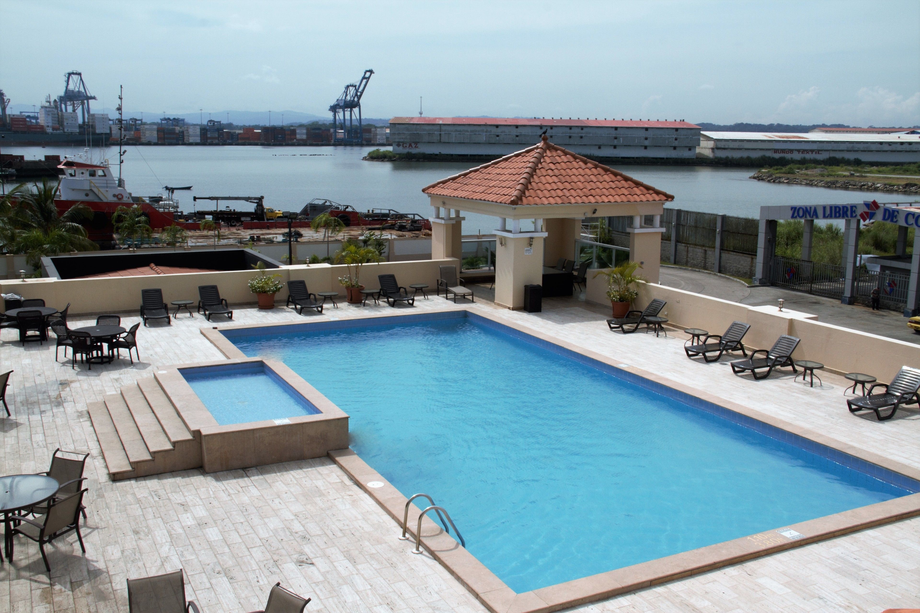 Outdoor pool, open 6 AM to 8 PM, sun loungers