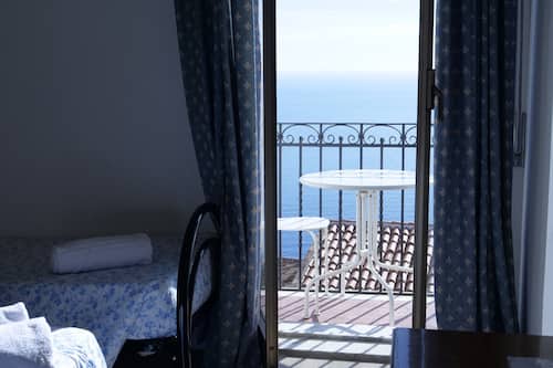 Deluxe vierpersoonskamer | Uitzicht op het water