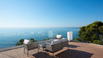 Departamento Deluxe, Terraza, vista al mar | Vista a la playa o el mar