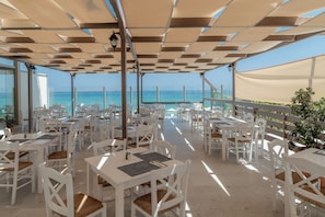 Breakfast, lunch, dinner served; beach views
